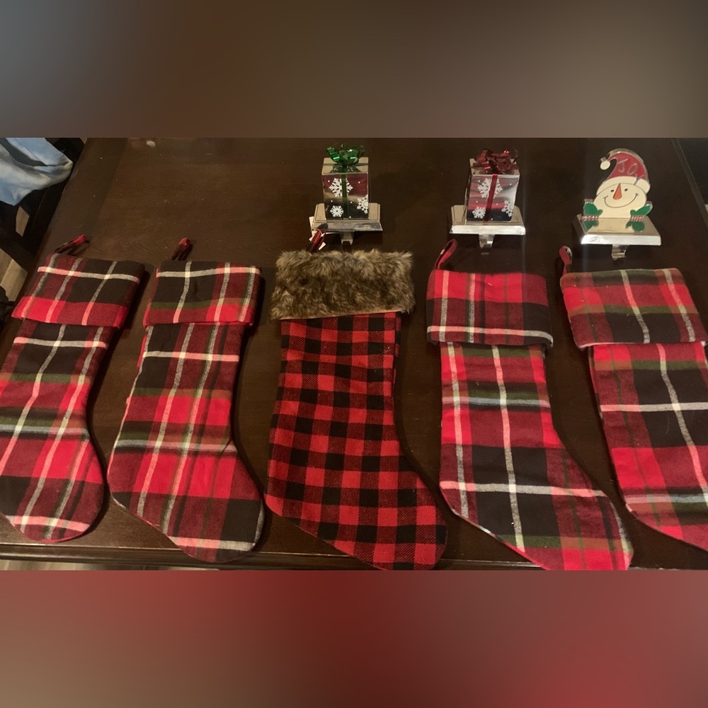 one fur stocking and 3 metal hangers